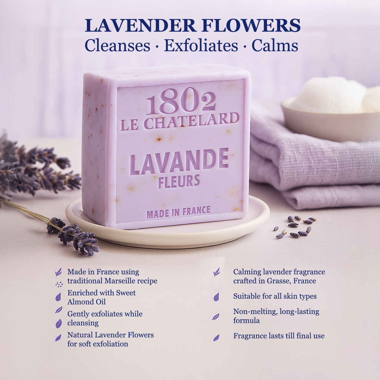1802 Le Chatelard Lavande Fleurs soap bar with lavender flowers and packaging on a light background