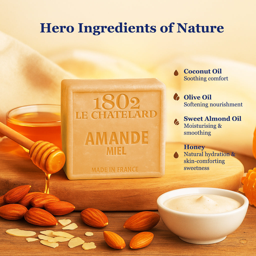 Le Chatelard 1802 Amande Miel soap with ingredients like coconut oil, olive oil, sweet almond oil, and honey on a wooden board.