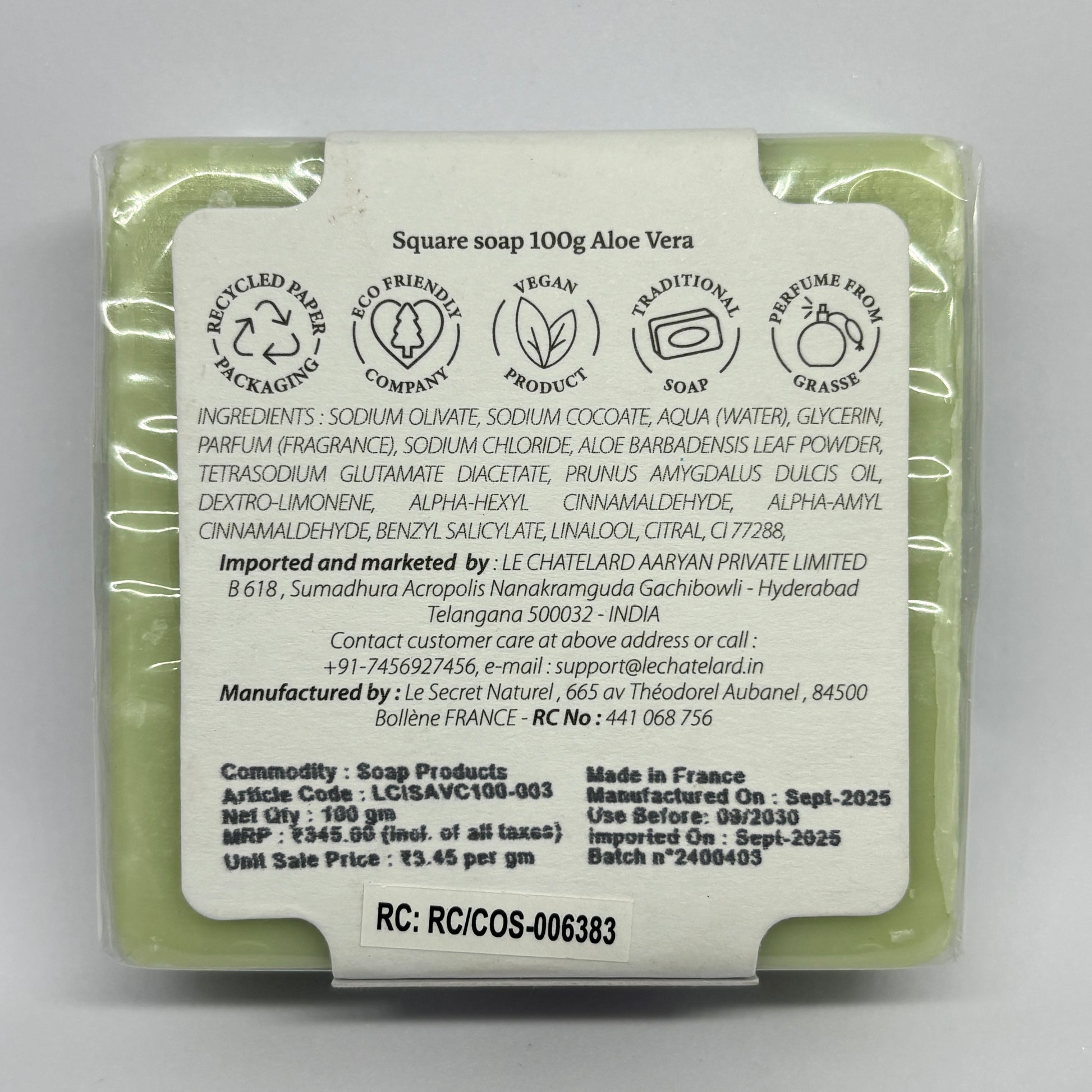 Aloe Vera soap bar with a label on a gray background
