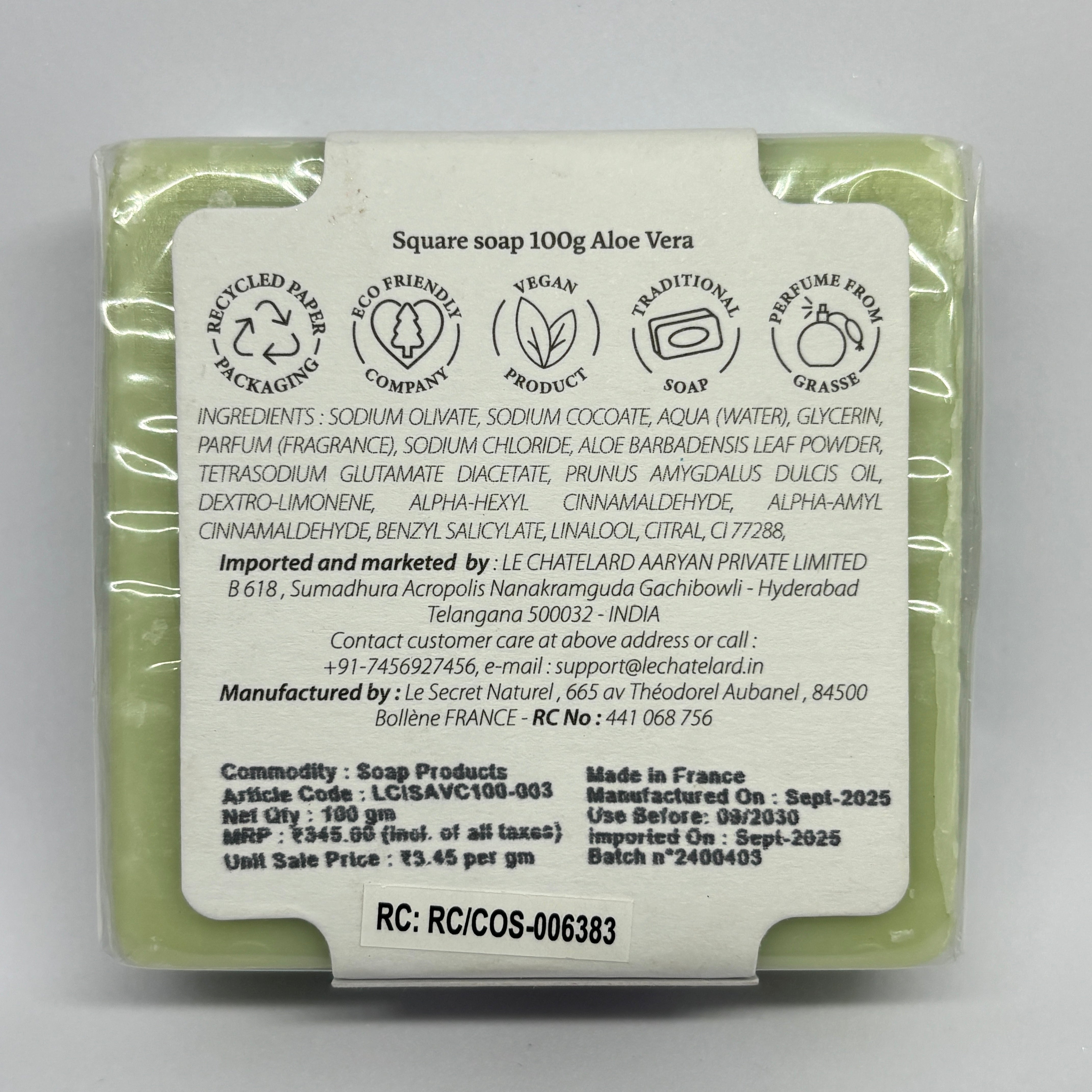 Aloe Vera soap bar with a label on a gray background