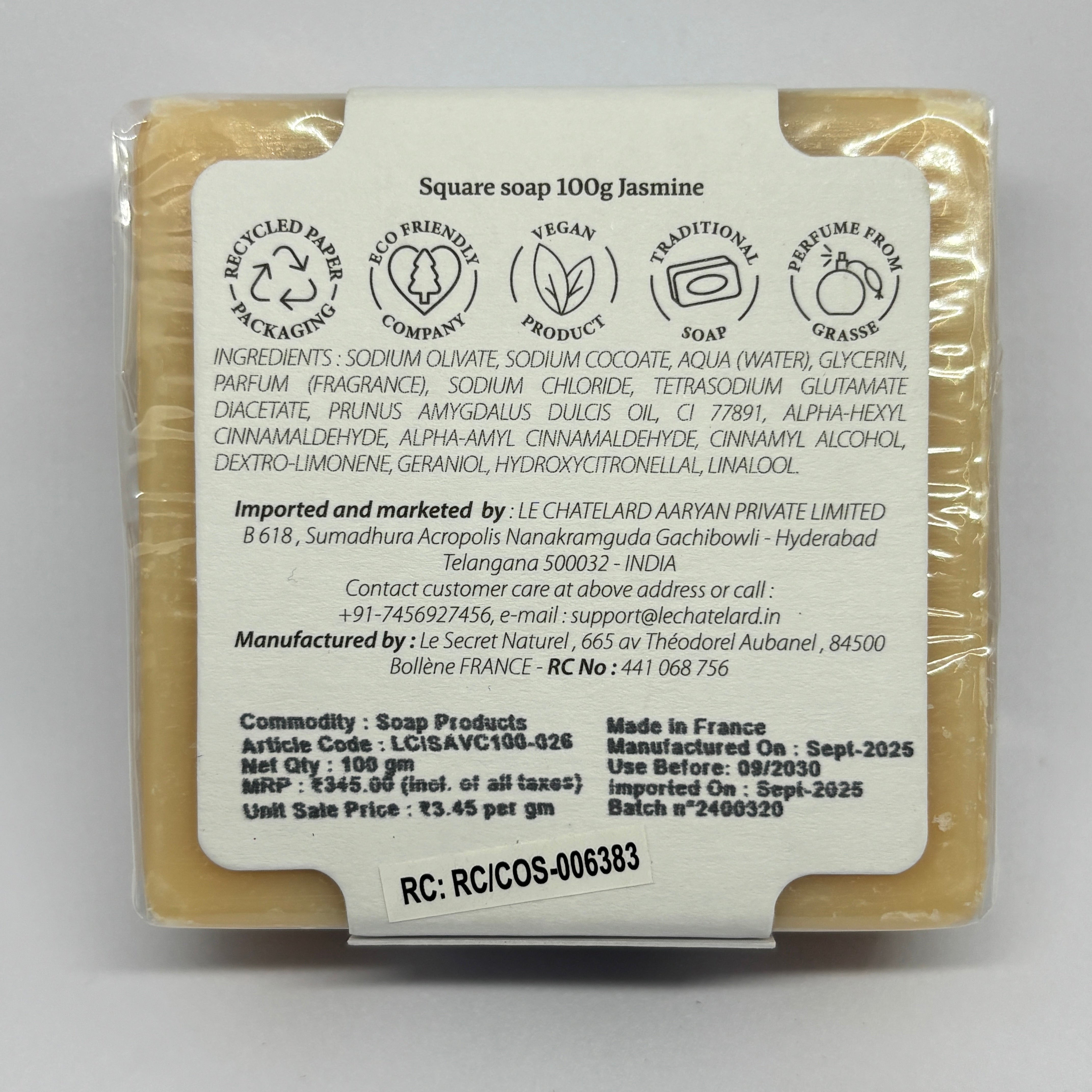 Bar of soap with a label on a white background