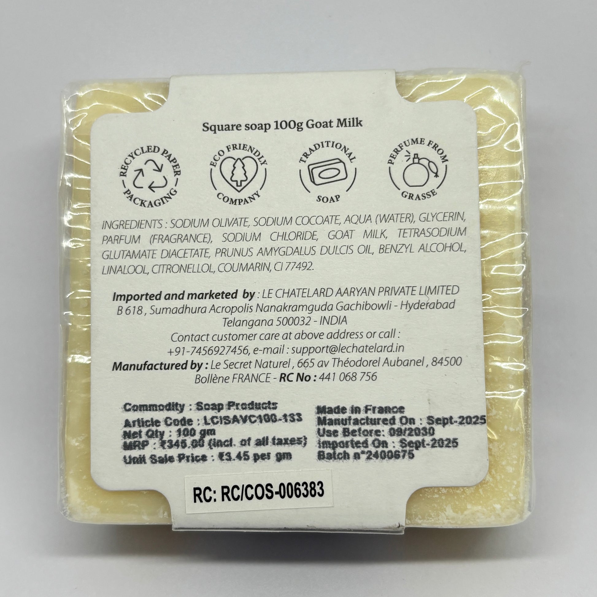 Bar of soap with a label on a white background