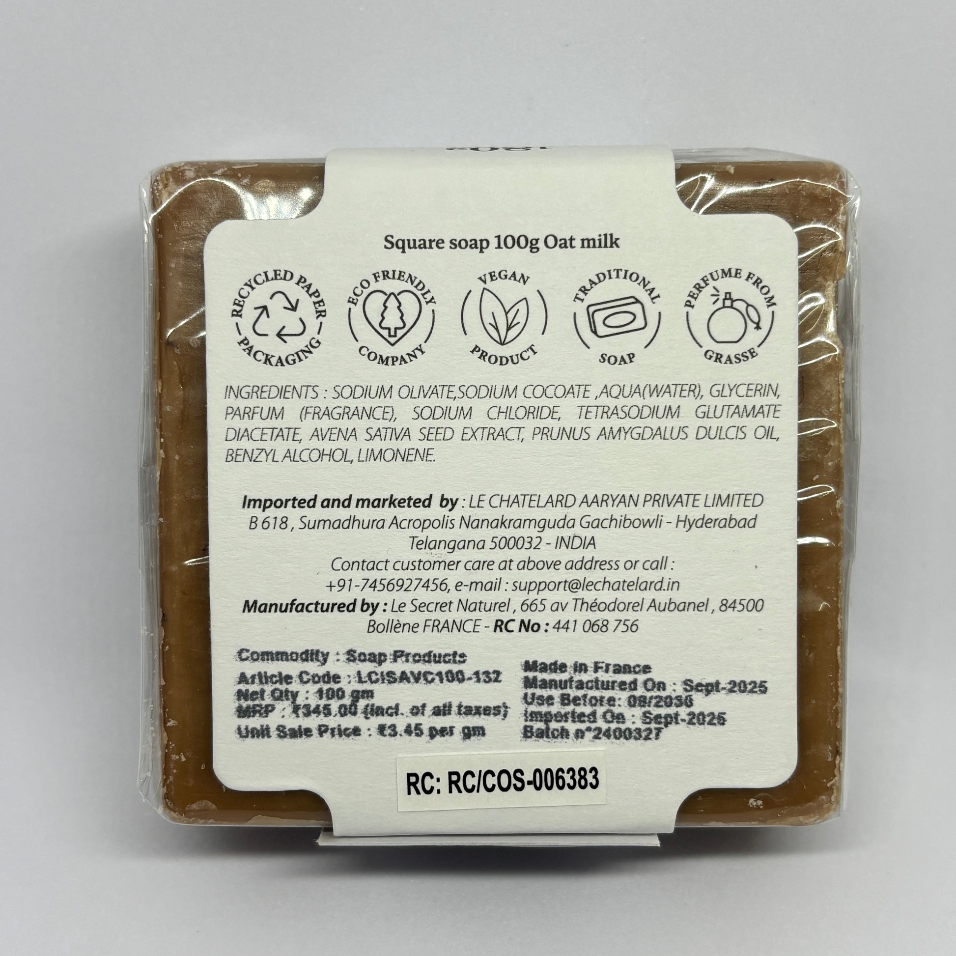 Bar of soap with a label on a white background