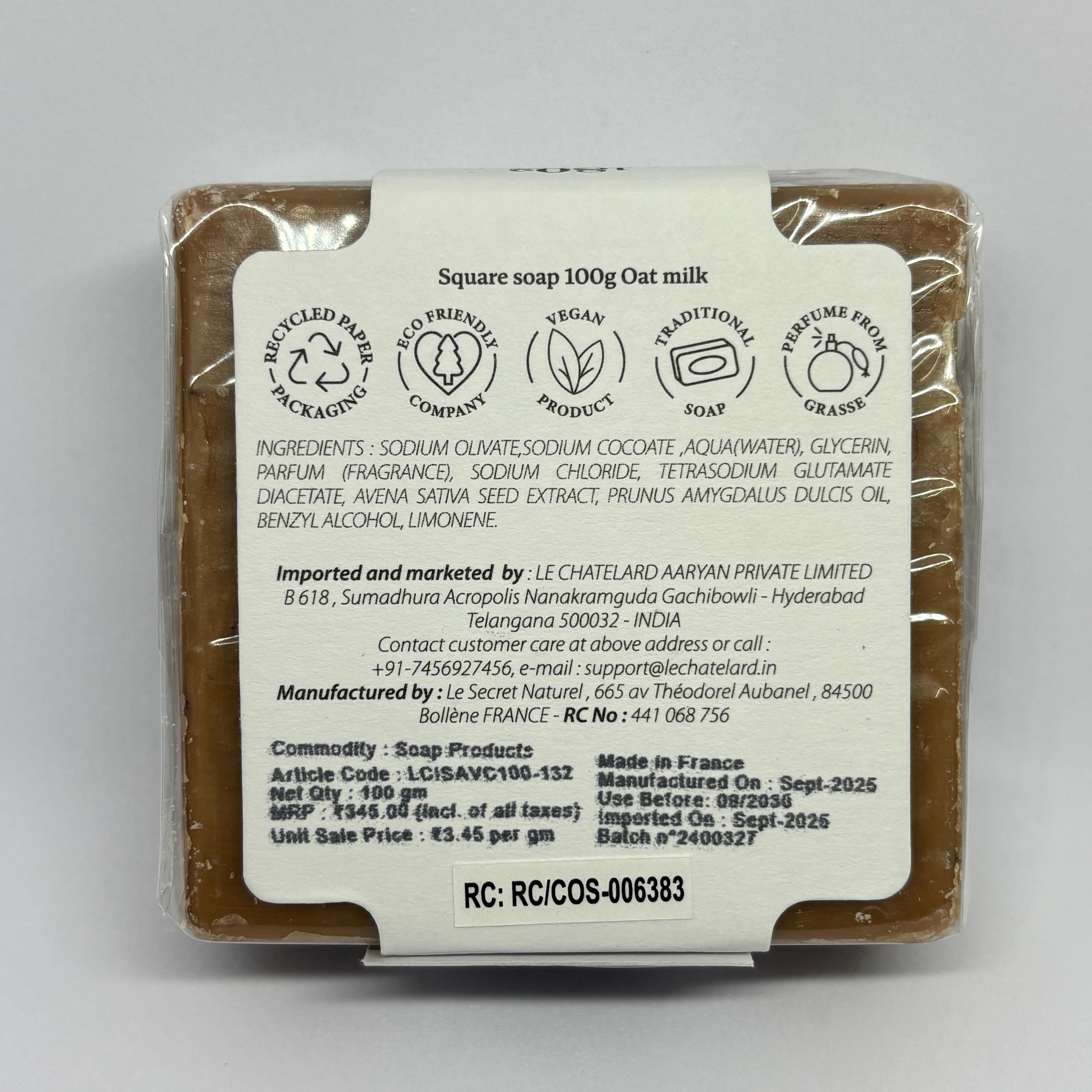 Bar of soap with a label on a white background