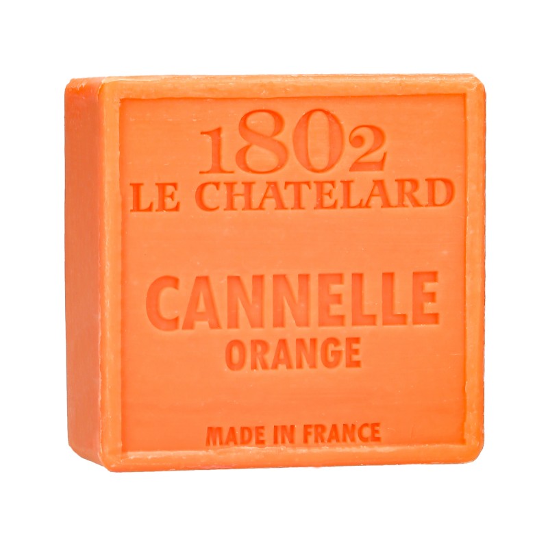 Orange bar of soap with '1802 Le Chatelard' branding on a white background